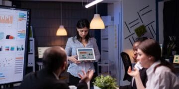 lead generation software woman showing graphs